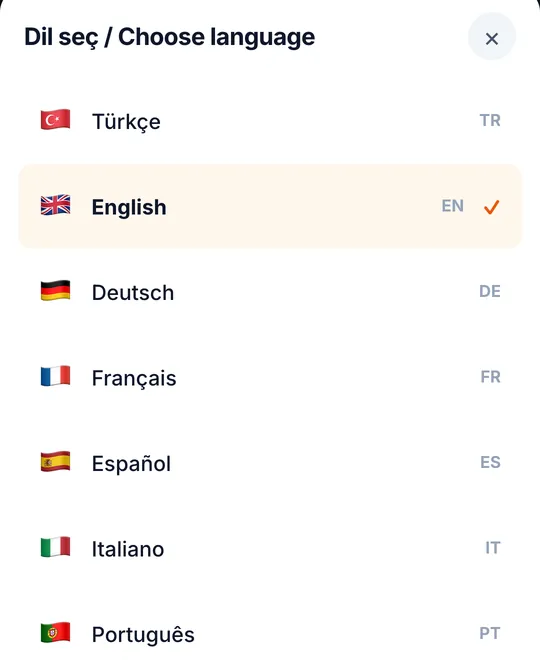 The language picker of a Thmenu guest menu listing Türkçe, English (selected), Deutsch, Français, Español, Italiano and Português